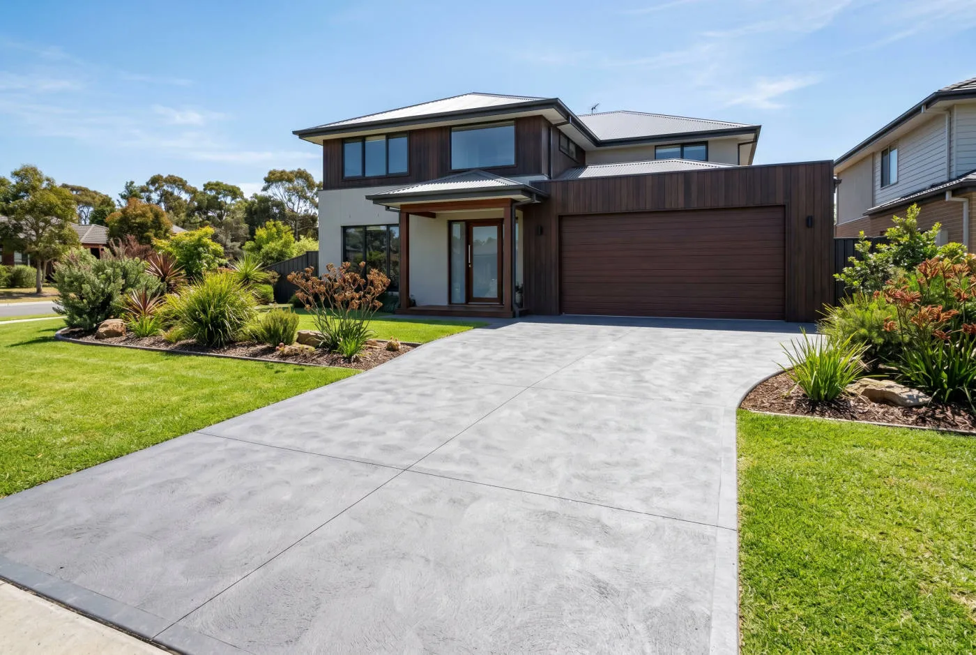 Newly poured concrete driveway on a sloped Adelaide Hills block
